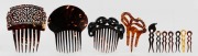 Assorted tortoiseshell and bakelite hair combs and hair pins, ​​​​​​​the largest 12cm high
