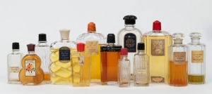 Thirteen assorted vintage perfume bottles including FORVIL, REVE D'OR and COTY, the largest 17cm high