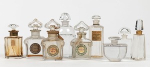 Nine assorted vintage French perfume bottles including four made by BACCARAT, 20th century, the largest 13.5cm high