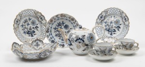 MEISSEN antique German blue and white porcelain teapot, pierced dishes, bowl, side plate and two teacups with saucers, 19th century, (9 items), blue crossed sword mark to bases, the teapot 15cm high