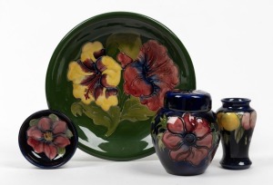 MOORCROFT&nbsp;"Hibiscus" plate on green ground, miniature "Wisteria" vase, "Anemone" dish and ginger jar, (4 items), factory marks to the bases, ​​​​​​​the plate 21.5cm diameter