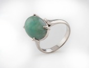 A 14ct white gold and jade ring, stamped "14K", ​​​​​​​4.7 grams