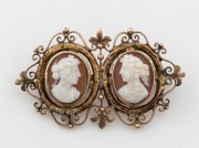 An antique 9ct yellow gold double cameo brooch, 19th century, 4.5cm wide, 6.8 grams