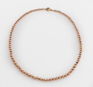 An antique 9ct rose gold graduated bead necklace, circa 1910, 41cm long, 19 grams