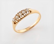 An antique 18ct yellow gold ring, set&nbsp;with five graduated old cut white diamonds, late 19th century, ​​​​​​​size M, 2.1 grams