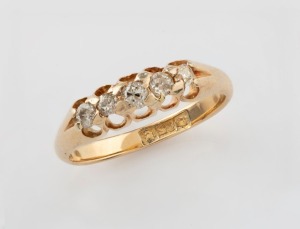 An antique 15ct yellow gold ring, set with five graduated old cut white diamonds, circa 1900, size L, 2.7 grams