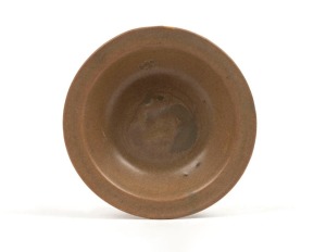 An antique Chinese brown glazed dish, Song Dynasty, 10th century, 12cm diameter