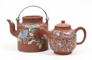 Two Chinese YIXING pottery teapots with enamel floral decoration, the larger 14cm high