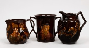 ROYAL DOULTON KINGSWARE&nbsp;porcelain loving cup and two jugs, early 20th century, (3 items), black factory mark to bases, the largest 18cm high