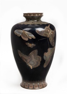 A fine Japanese cloisonne vase in the manner of HAYASHI KODENJI, adorned with butterflies, Meiji Period, 19th/20th century, (A/F), 25cm high