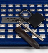 THE MEDALLIC REGISTER OF THE WORLD'S GREAT SHIPS sterling silver miniature collection in original box with accompanying&nbsp;documentation. Each piece stamped "925" with ship's details. 2 grams a piece. 105 grams total. - 2
