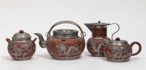 A Chinese YIXING&nbsp;four piece&nbsp;pottery tea set with pewter mounts, 20th century, the teapot 13cm high