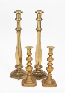 Two pairs of antique brass candlesticks, 19th century, 42cm and 23cm high