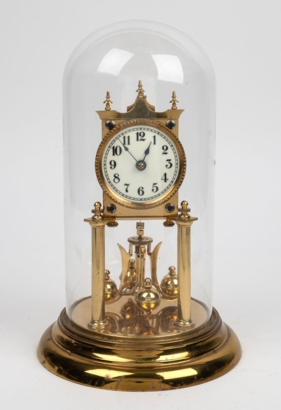 A German 400 day anniversary clock in glass dome, 20th century, ​​​​​​​31cm high