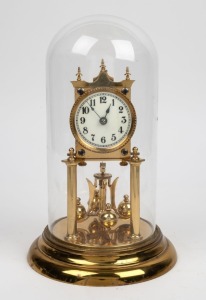 A German 400 day anniversary clock in glass dome, 20th century, 31cm high