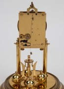 A German 400 day anniversary clock in glass dome, 20th century, ​​​​​​​31cm high - 2