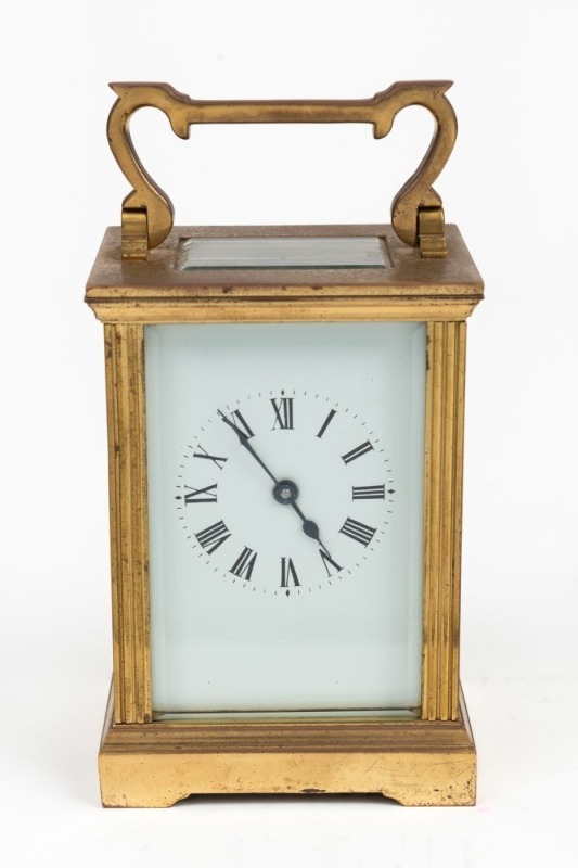 An antique French carriage clock with enamel dial and Roman numerals, 19th/20th century, 15cm high overall