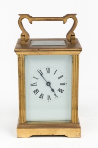 An antique French carriage clock with enamel dial and Roman numerals, 19th/20th century, 15cm high overall