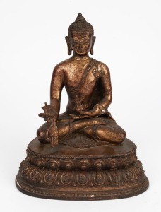A Chinese gilt bronze seated Buddha figure wearing a robe and sash covering his left shoulder and crossed legs, 20th century, 28cm high