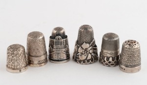 Seven assorted silver thimbles, mixed vintages and origins, the largest 2.8cm high, 50 grams total