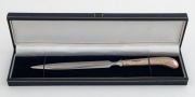 A sterling silver letter opener in blue leather case, 20th century, 21cm long