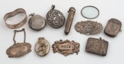 Antique silver vestas, lockets, decanter labels, napkin&nbsp;ring, cigarette holder case and brooch, 19th/20th century, (10 items), 180+ grams silver weight