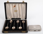 A sterling silver cigarette case by Walker & Hall of Birmingham, 64 grams; together with a boxed set of sterling silver coffee bean spoons (missing two beans), (2 items)