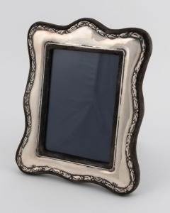 An antique sterling silver picture frame, London made, circa 1908, 19cm high