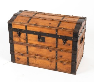 An antique Baltic pine dome-top trunk with carry handles and oak and metal bindings, 19th century, 55cm high, 76cm wide, 44cm deep