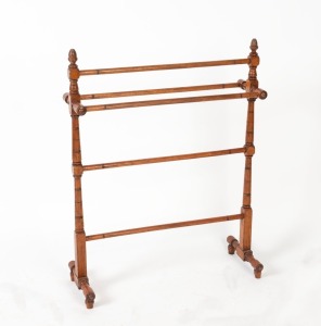 A Colonial Australian hardwood towel rail, 19th century, 92cm high, 72cm wide, 21cm deep