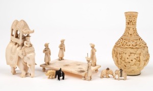 Indian carved ivory figures, assorted elephant charms (bone, plastic and wood) and a Chinese faux ivory vase, 20th century, (10 items), ​​​​​​​the vase 9cm high