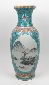 A Chinese porcelain vase with enamel decoration and landscape panels decorated with lotus and peonies, Republic period, 20th century, red seal mark to base, ​​​​​​​62cm high