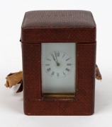 An antique miniature carriage clock in original leather case with key, 19th century, 10.5cm high including handle - 2