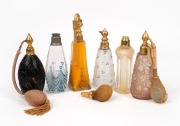 Six assorted French Art Deco glass perfume atomisers, circa 1920s to 1930s, the largest 18cm high