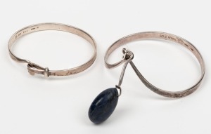GEORG JENSEN two Danish sterling silver bangles, one with polished lapis charm, oval factory stamps to the interiors,