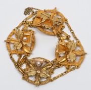 An 18ct yellow gold orchid bracelet with two pearls, 20th century, 23.5 grams
