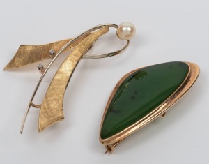 Two gold brooches, one 9ct gold set with New Zealand nephrite greenstone, the other 14ct gold set with cultured pearl and brilliant cut white diamonds, the larger 5.5cm wide