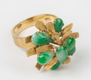 An 18ct gold and jade cocktail ring, stamped "18k", 6.8 grams
