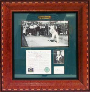 DON BRADMAN, display "Sir Donald Bradman A.C.", with signature on piece, window mounted with two photographs, limited edition 658/2500, framed & glazed, overall 53x56cm. With CoA.