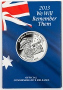 2013 Macquarie Mint "We Will Remember Them" folder containing&nbsp;the Australian $2 Remembrance coin, a 2g gold "We will Remember Them" piece, a Nauru $10 and a Kiribati $10, both in silver.