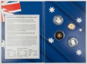 2013 Macquarie Mint "We Will Remember Them" folder containing&nbsp;the Australian $2 Remembrance coin, a 2g gold "We will Remember Them" piece, a Nauru $10 and a Kiribati $10, both in silver. - 2
