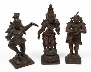 Three antique Tibetan bronze statuettes including a Monkey god, the largest 10cm high