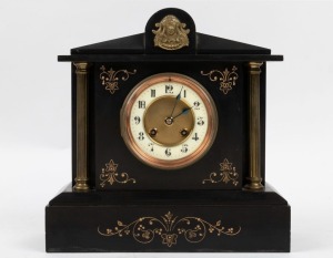 An antique French mantle clock in black slate case with ormolu mounts, eight-day time and strike movement with Arabic numerals, 19th century, 30cm high