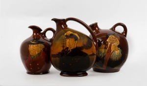 Three ROYAL DOULTON KINGSWARE&nbsp;whisky flagons, 20th century, black factory mark to bases, the largest 18.5cm high