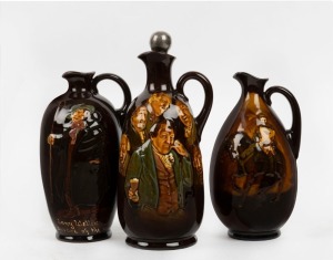 Three ROYAL DOULTON KINGSWARE whisky flagons, comprising "Crusader", "Memories" and "Tony Weller", early 20th century, black factory mark to bases, the largest 23m high