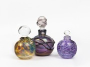 Three Australian art glass perfume bottles by DON WREFORD, RICHARD MORRELL and one other, the largest 10.5cm high