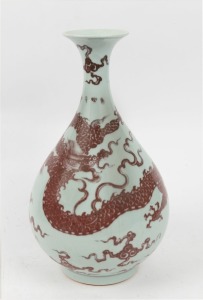 A Chinese porcelain vase with underglazed copper red five clawed dragon decoration in the Yuan style, Republic period, 20th century, ​​​​​​​36cm high