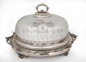 An antique English silver plated meat cover with engraved crest on warming stand, mid 19th century, an impressive 40cm high, 70cm wide, 45cm deep