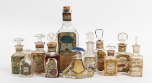 Eleven assorted antique and vintage perfume and eau de cologne bottles, all with original stoppers and lithographed paper labels, 19th/20th century, the largest 18cm high