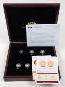 Macquarie Mint: The Smallest Gold Coins of the World Collection: Five different 14-carat gold coins, issued on behalf of various countries and commemorating Apollo 8, Vasco da Gama, Mozart, the Australian Gold Rush, etc. Attractively presented in a custom